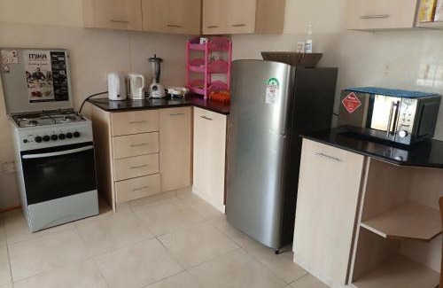 Syokimau Apartment | Relaxing JKIA Homestays with Pool & Family-Friendly Amenities