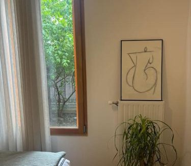 L'Ile-Saint-Denis Apartment | Cozy Apartment Near Paris with Family-Friendly Amenities
