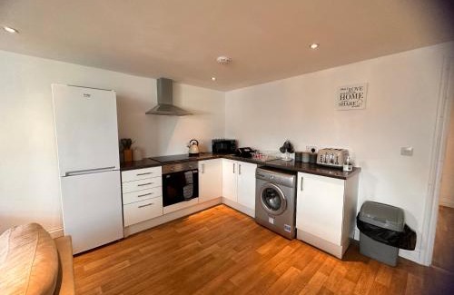 Withernsea Apartment | Discover Comfort at Joe Kelly Buildings C - Family Friendly Stay