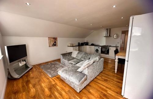 Withernsea Apartment | Discover Comfort at Joe Kelly Buildings C - Family Friendly Stay