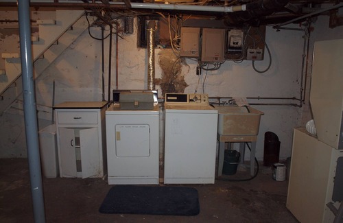 Cheboygan Apartment | Discover Joe's River Escape: Eco-Friendly Lakefront Retreat
