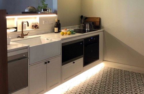Dunedin City Centre Apartment | Explore the John Campbell Apartment with Accessible Amenities