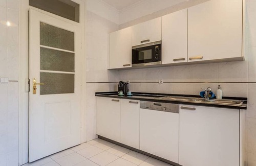 Merces Apartment | JOIVY 3BR Apartment with Workspace Near Lisbon's Gardens