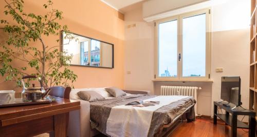 Ghisolfa Apartment | Family-Friendly JOIVY Flat for 6 with Terrace in Milan