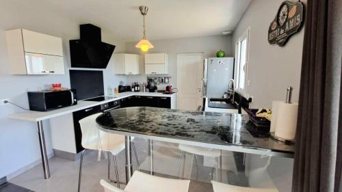 Carves House | Inviting Le Petit Coin de Bonheur with Scenic Views