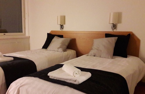 Kaakkoinen District Hotel | Discover Jollas89 Hotelli: Family-Friendly with Pool & Spa