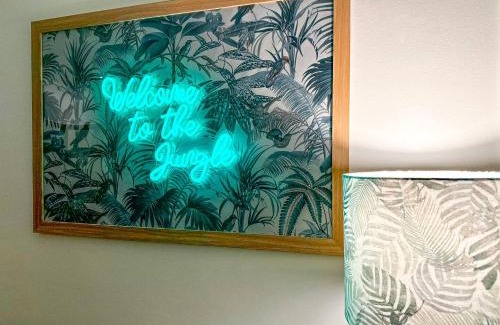 Rhondda Cynon Taff Apartment | Delightful Jungle Retreat with Balcony & Fun Foozeball