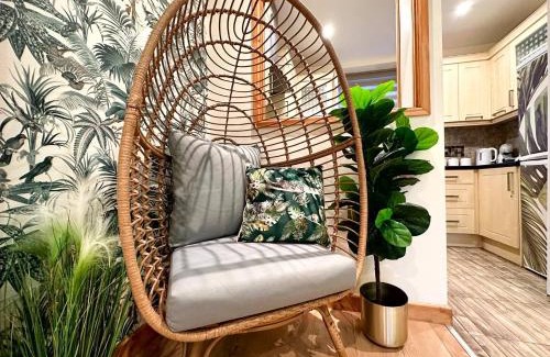 Rhondda Cynon Taff Apartment | Delightful Jungle Retreat with Balcony & Fun Foozeball