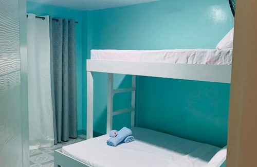 Tampilisan Hotel | Family-Friendly Stay at JRJJ Apartelle for Budget Travelers
