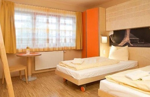 Leibnitz Hotel | Discover JUFA Hotel Leibnitz: Poolside Relaxation Awaits