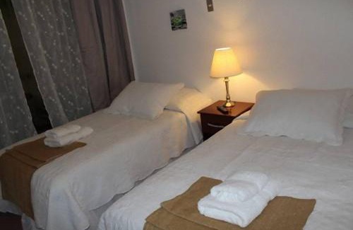 Calama House | Budget-Friendly Juku Hostal with Pool & Child-Friendly Amenities