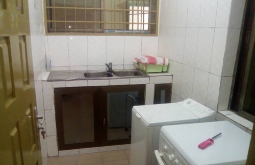 Lome Apartment | JULMARTE Twins Apartment: Oceanfront Stay with Pool Access