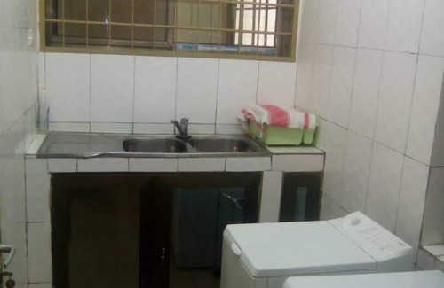 Lome Apartment | JULMARTE Twins Apartment: Oceanfront Stay with Pool Access