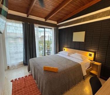 Pavas Bed & Breakfast | Discover Jungla Urbana: Guest Rated 9.5 with Kitchen Access