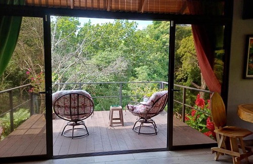 Escobal House | Discover Jungle River: Family-Friendly & Pet Welcoming Escape