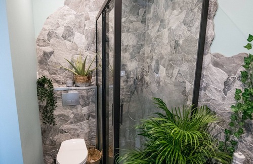 Plaine Centre Ville Apartment | Escape to the Jungle Room: Cozy Luxury Near Transit
