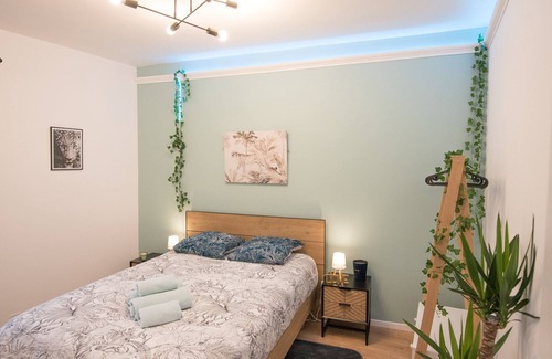 Plaine Centre Ville Apartment | Escape to the Jungle Room: Cozy Luxury Near Transit