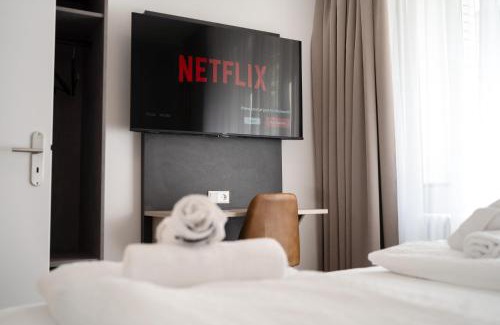 Oberhausen Apartment | Modern JUNIK Apartments Oberhausen - Family-Friendly Stay