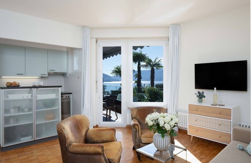 Ascona Apartment | Impressive Junior Suite Classic with Lake View & Spa Access