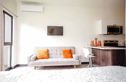 Alajuela Apartment | Convenient Stay: 5 Minutes from Airport with Pool Access