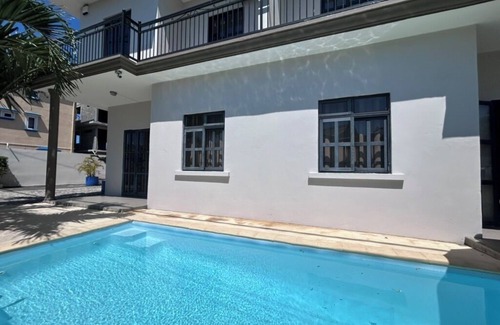 Pereybere Villa | Ideal Location: Steps from the Beach, Dining & Fun Amenities
