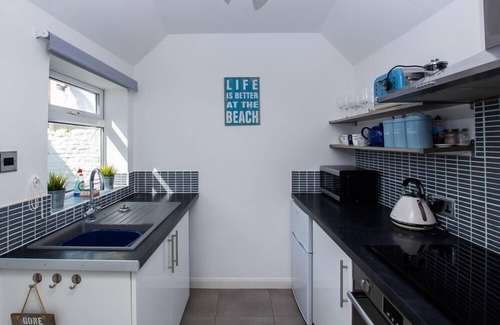 Deal Cottage | Steps from Pebble Beach with Ocean Views and Pool Access