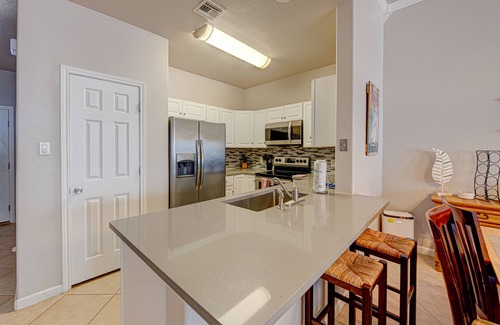 Safe Harbor Condo | Steps to the Beach with a Community Pool for 8 Guests!