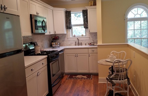Garden District Cottage | Exclusive Guest Cottage with Lake View & Model T Ride