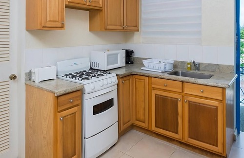 St. Lawrence Gap Hotel | Oceanfront Getaway with Kitchen and Onsite Pool Access