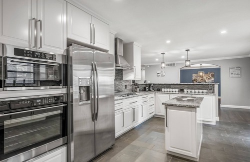 Central Oklahoma City House | Unforgettable JustLikeHome OKC - Luxury Stay with Pool & Spa