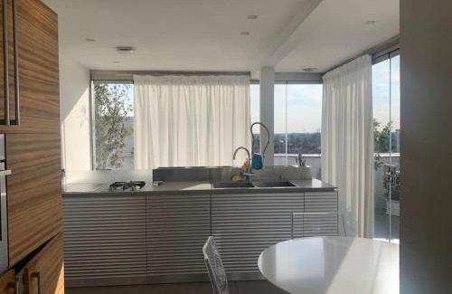 Pordenone Apartment | Stunning Attico K2 with Panoramic Terrace and Ocean Views
