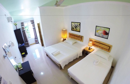 Guraidhoo House | Discover Kaafu Inn Guraidhoo: Family-Friendly Getaway