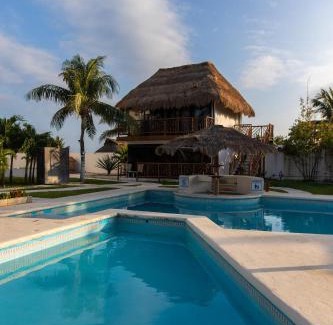 Puerto Morelos Hotel | Kabañas & Beach Club Ojo de Agua