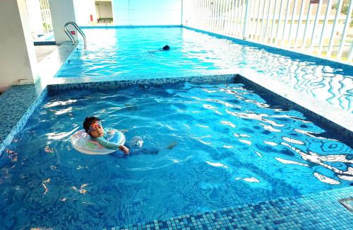 Central Seberang Perai Apartment | Relaxing KAF Homestay: Pool, Kids Trampoline & Game Console