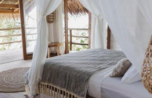 Pulau Masokut Resort | Experience Kaini Mentawai: Oceanfront Retreat with Pets Welcome