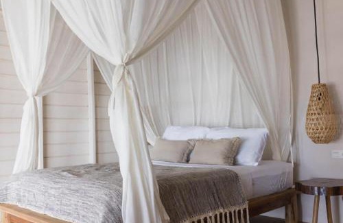 Pulau Masokut Resort | Experience Kaini Mentawai: Oceanfront Retreat with Pets Welcome