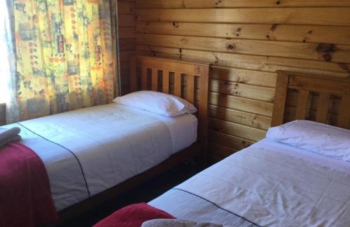 Kairaki Beach Villa | Family-Friendly Kairaki Beach Motor Camp with Ocean Views