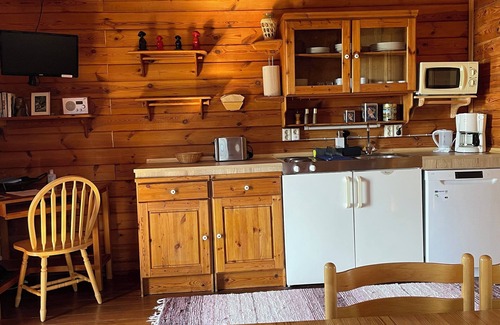 Husavik Cabin | Discover Kaldbaks-kot Cottages: Pet-Friendly Retreat