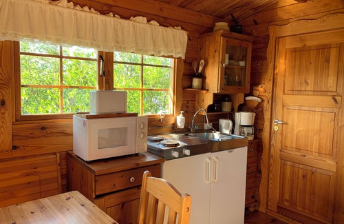 Husavik Cabin | Discover Kaldbaks-kot Cottages: Pet-Friendly Retreat