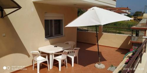 Kalyves Polygyrou Apartment | Oceanfront Kalives Summer House with Fireplace & Child-Friendly Amenities