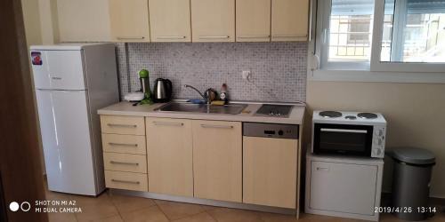 Kalyves Polygyrou Apartment | Oceanfront Kalives Summer House with Fireplace & Child-Friendly Amenities