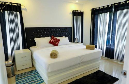 Kalpetta Villa | Discover Kallat British Resort: Oceanfront Bliss Awaits!
