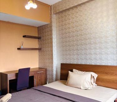 Pondokcina Apartment | Discover Kamar Apartemen Harian: Poolside Comfort in Depok