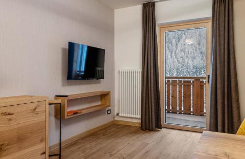 Campitello di Fassa Apartment | Guest Rated 10/10 at Residence Kamerloy F - Pet & Child Friendly