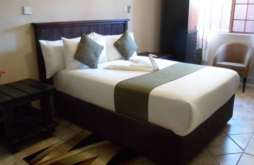 Gumare House | Budget-Friendly Kamore Guest Inn with Family Amenities