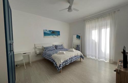 Ladispoli Apartment | Experience Kannur: Oceanfront Retreat with Private Beach