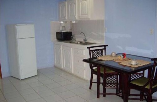 Georgetown Hotel | Discover Kanuku Suites: Family-Friendly with Dining Options