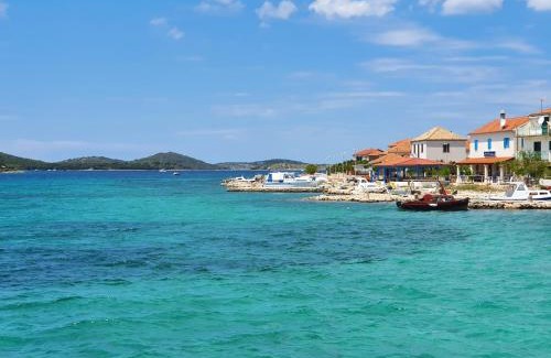 Kaprije Apartment | Oceanfront Kaprije Mistral Apartment - Guest Rated 9.8/10