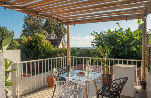 Entebbe House | Unwind at Karibu Entebbe: Oceanfront Bliss and Spa Retreat