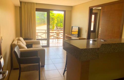 Cumbuco Apartment | Kariri Beach: Oceanfront Retreat with Pool & High Ratings